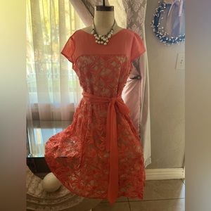 Spring dress. Orange lace.